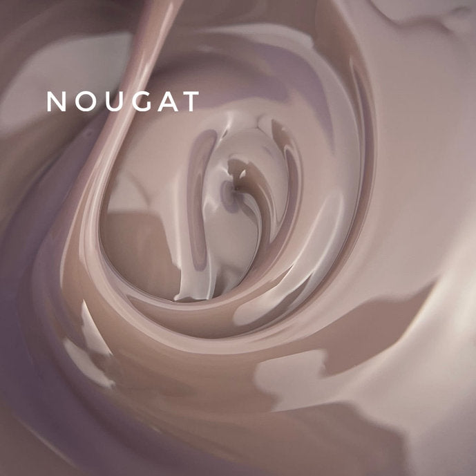 Swirl of glossy, nude brown gel polish labeled Nougat for manicure nail art