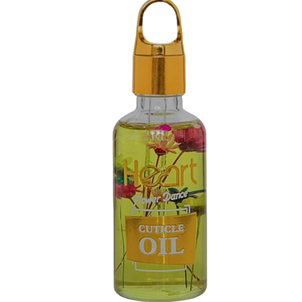 Cuticle oil in clear bottle with golden cap and colorful dried flowers, nail care product