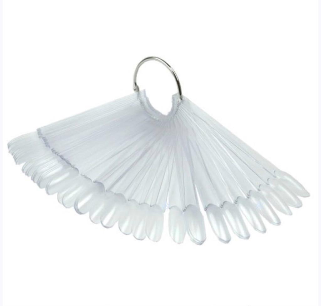 Clear nail tip display fan for polish and gel color samples, manicure tool on ring