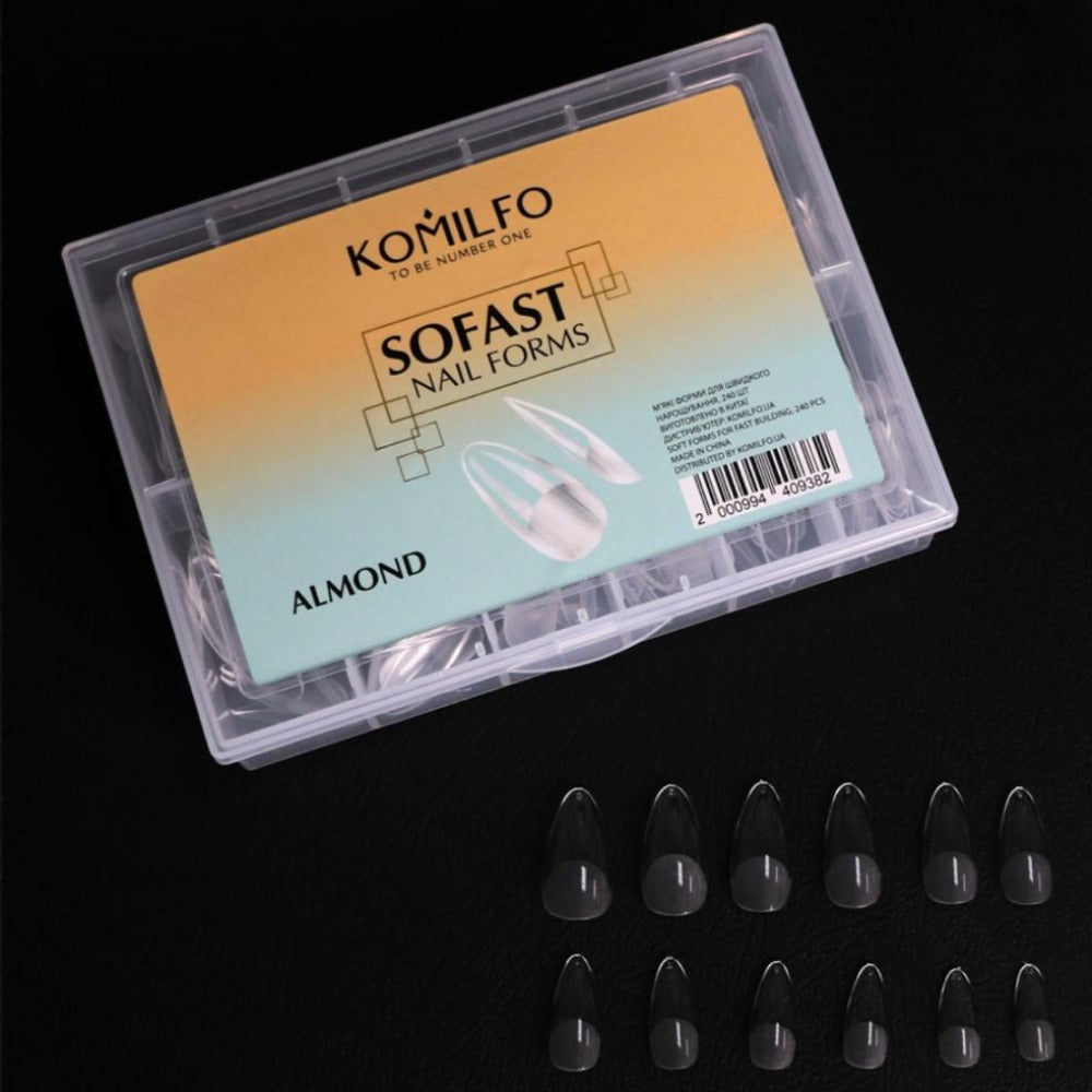 Almond-shaped clear nail forms set for manicure, displayed in a plastic case with samples.