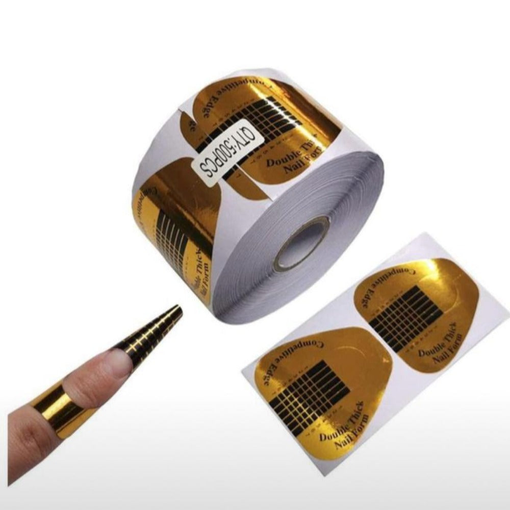 Gold nail extension forms for acrylic or gel nail sculpting, nail art supplies roll.