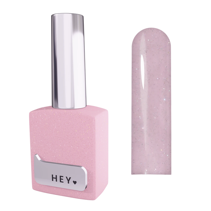 Light pink glitter nail polish bottle with swatch, professional manicure product