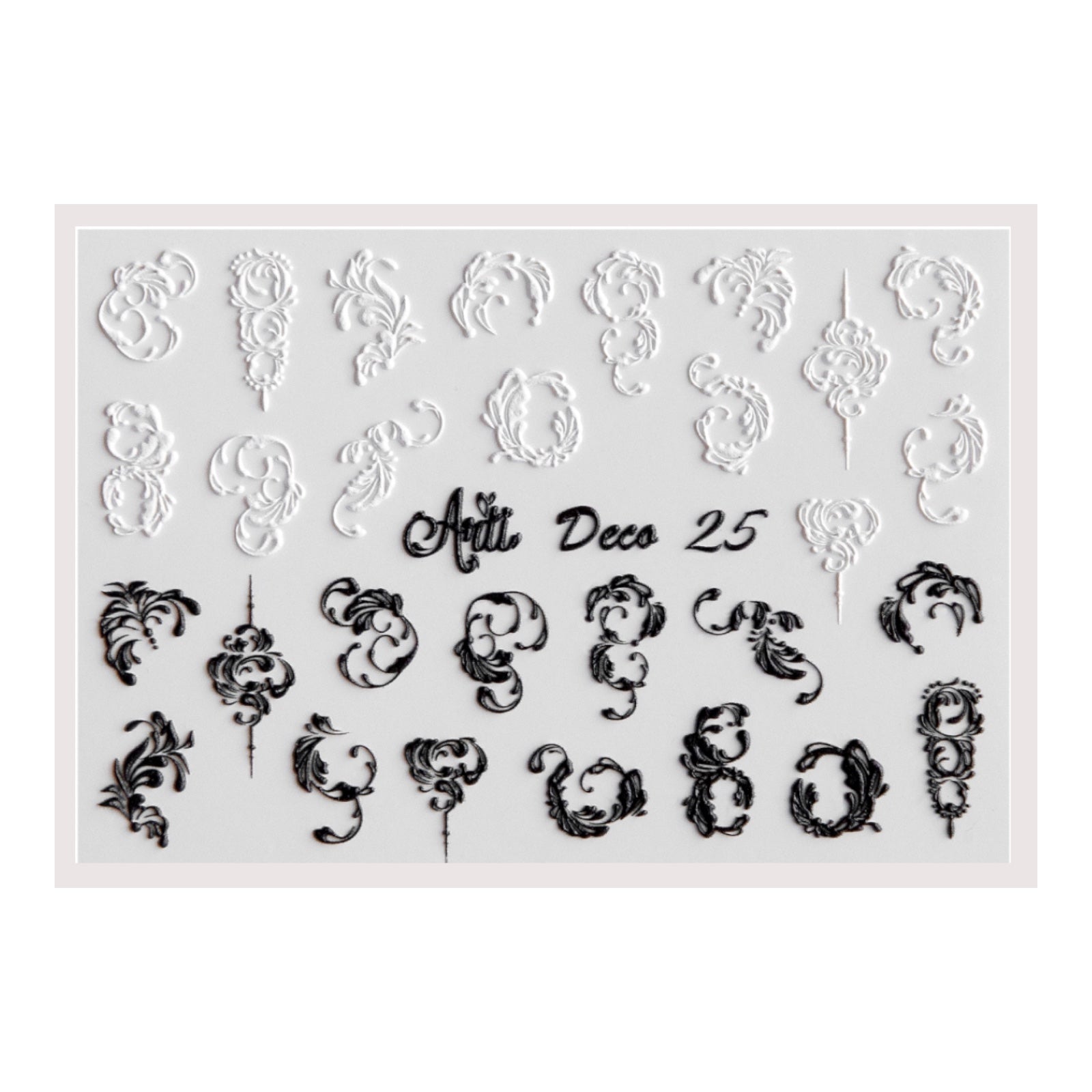 Sheet of black and white ornate nail art stickers with decorative scroll designs for manicures