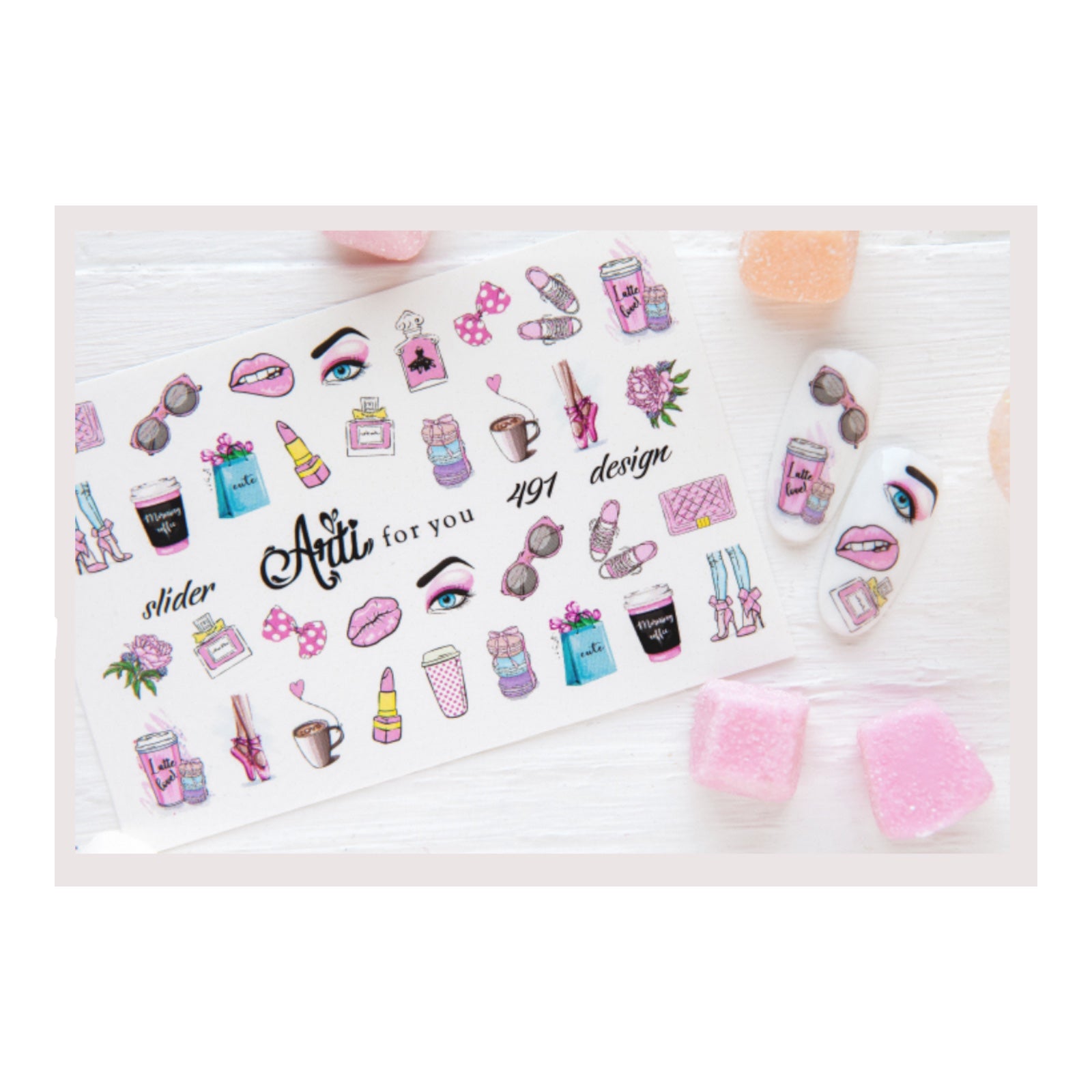 Colorful nail art stickers with makeup, coffee, and fashion icons on a white background, nail design accessories