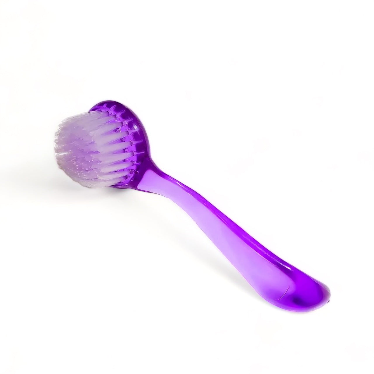 Purple manicure nail brush with clear bristles for nail cleaning on white background