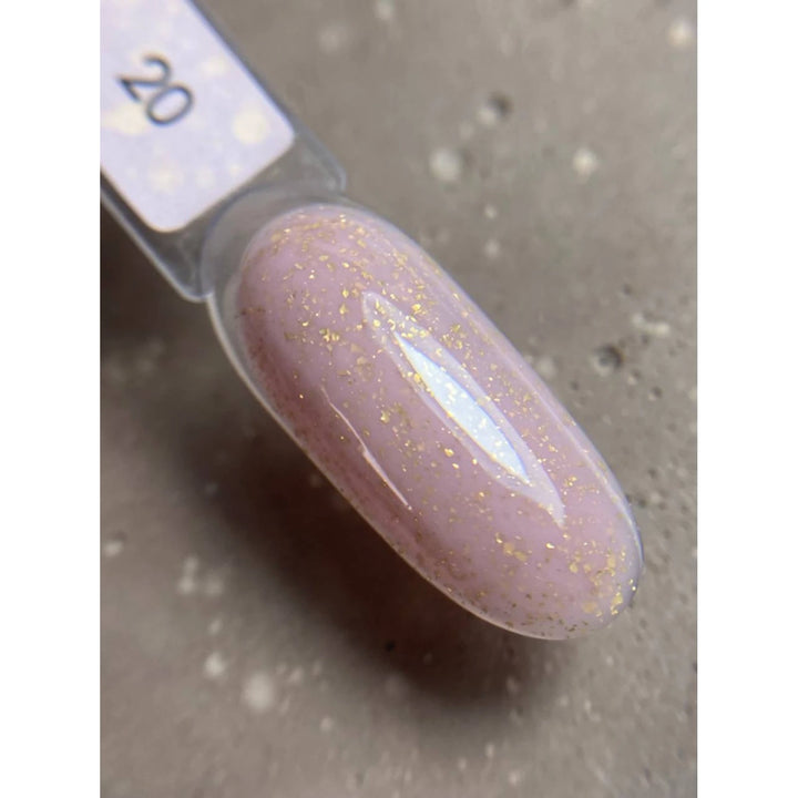 Swatch of pink UV gel nail polish with fine gold glitter, labeled shade 20