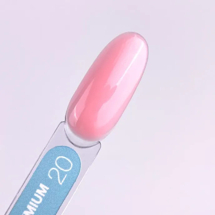 Swatch of pink builder gel for nails on a sample stick, labeled with the number 20.