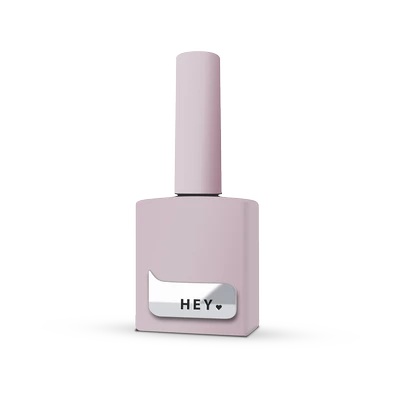 Light pink gel nail polish bottle for manicures and pedicures on white background