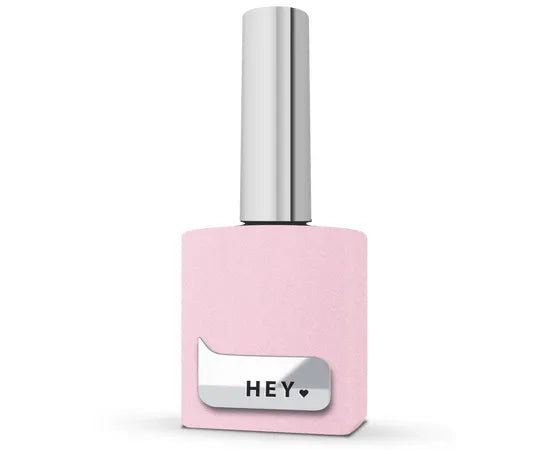 Light pink gel nail polish bottle with silver cap and 'HEY' label for manicure use