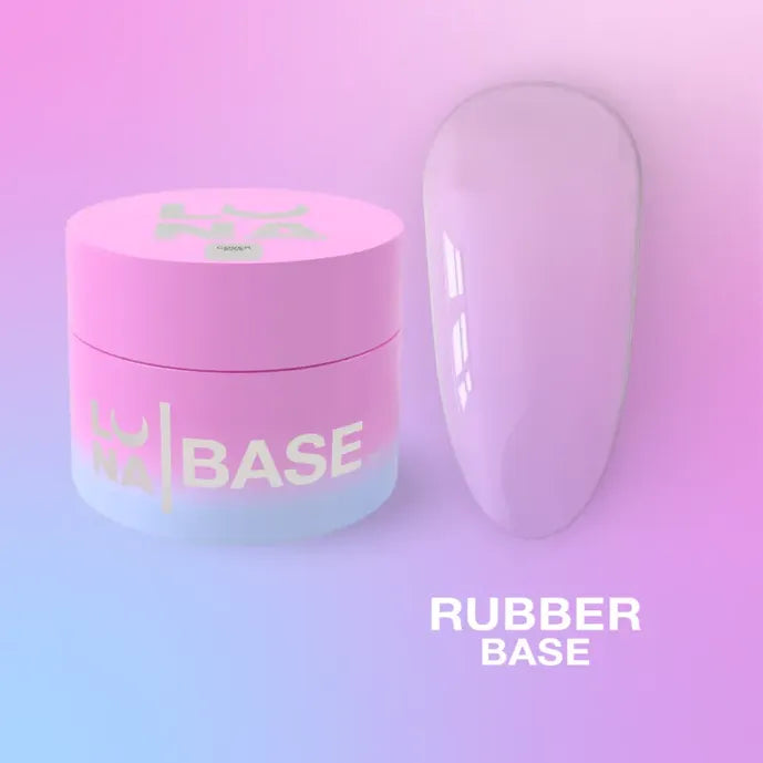 Pink jar of rubber base gel for nails with a swatch of milky pink nail color on a gradient background.