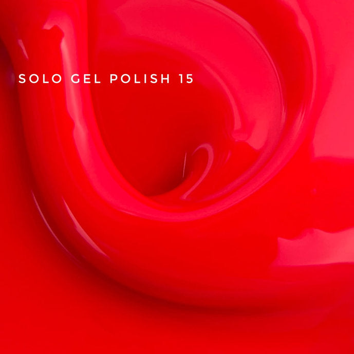 Vivid red UV gel polish closeup with glossy texture, labeled Solo Gel Polish 15 for manicures