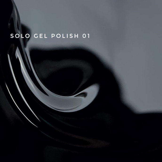 Glossy black gel polish swatch with Solo Gel Polish 01 text, manicure product