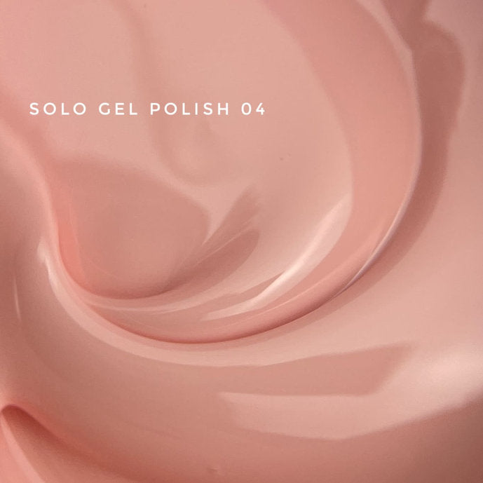Glossy light pink gel polish texture, labeled Solo Gel Polish 04, for manicures and nail art.