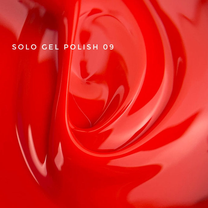 Glossy bright red UV gel polish texture, Solo Gel Polish 09, close-up for manicure.