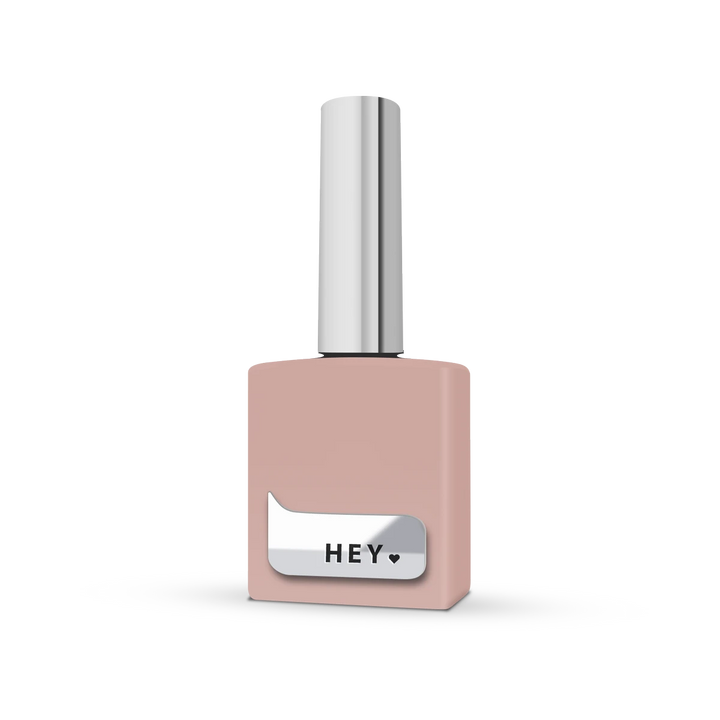 Nude pink gel nail polish bottle with silver label and metallic cap for manicure