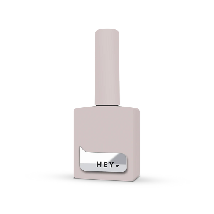 Neutral pink gel nail polish bottle with silver &