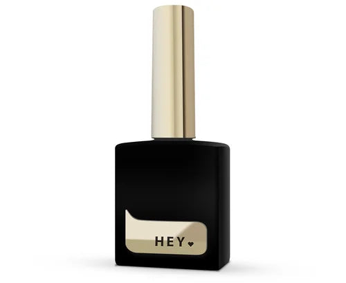 Black nail polish bottle with gold cap and 'HEY' label for manicure and pedicure