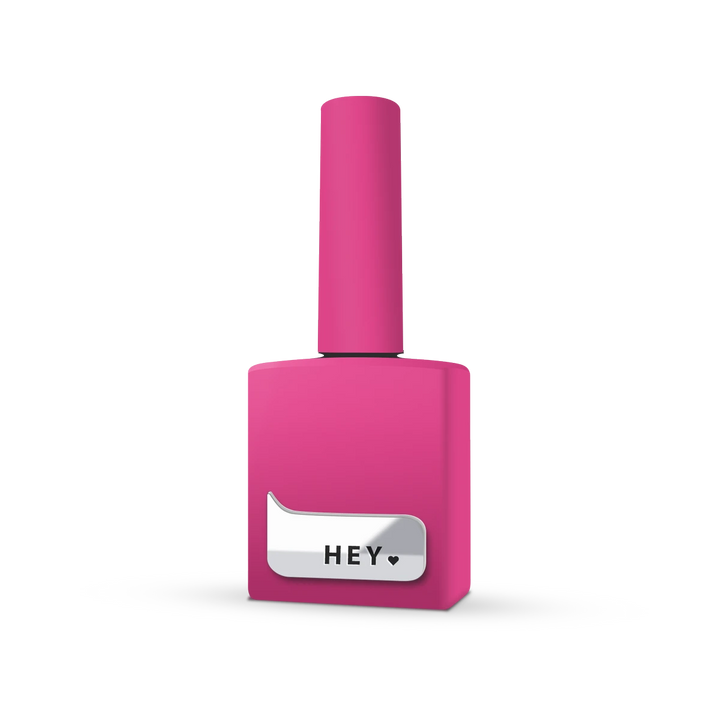 Pink gel nail polish bottle with label reading HEY, suitable for professional manicure.