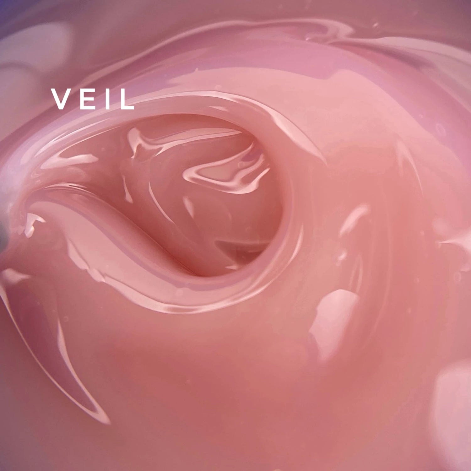 Close-up of pink UV gel for nails with glossy texture and 'Veil' text overlay.