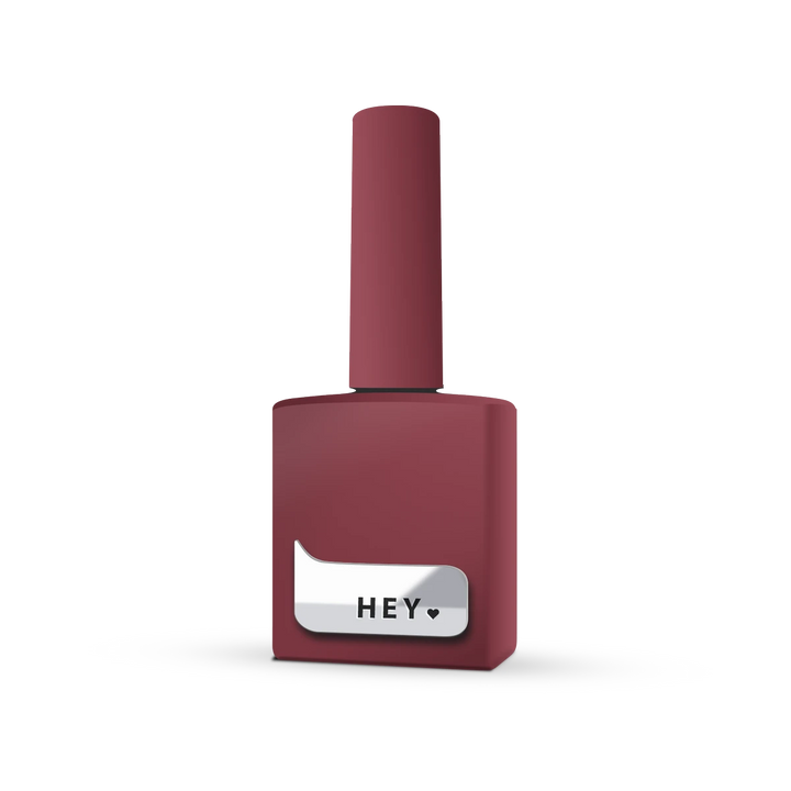 Wine red gel nail polish bottle with HEY label for professional manicure