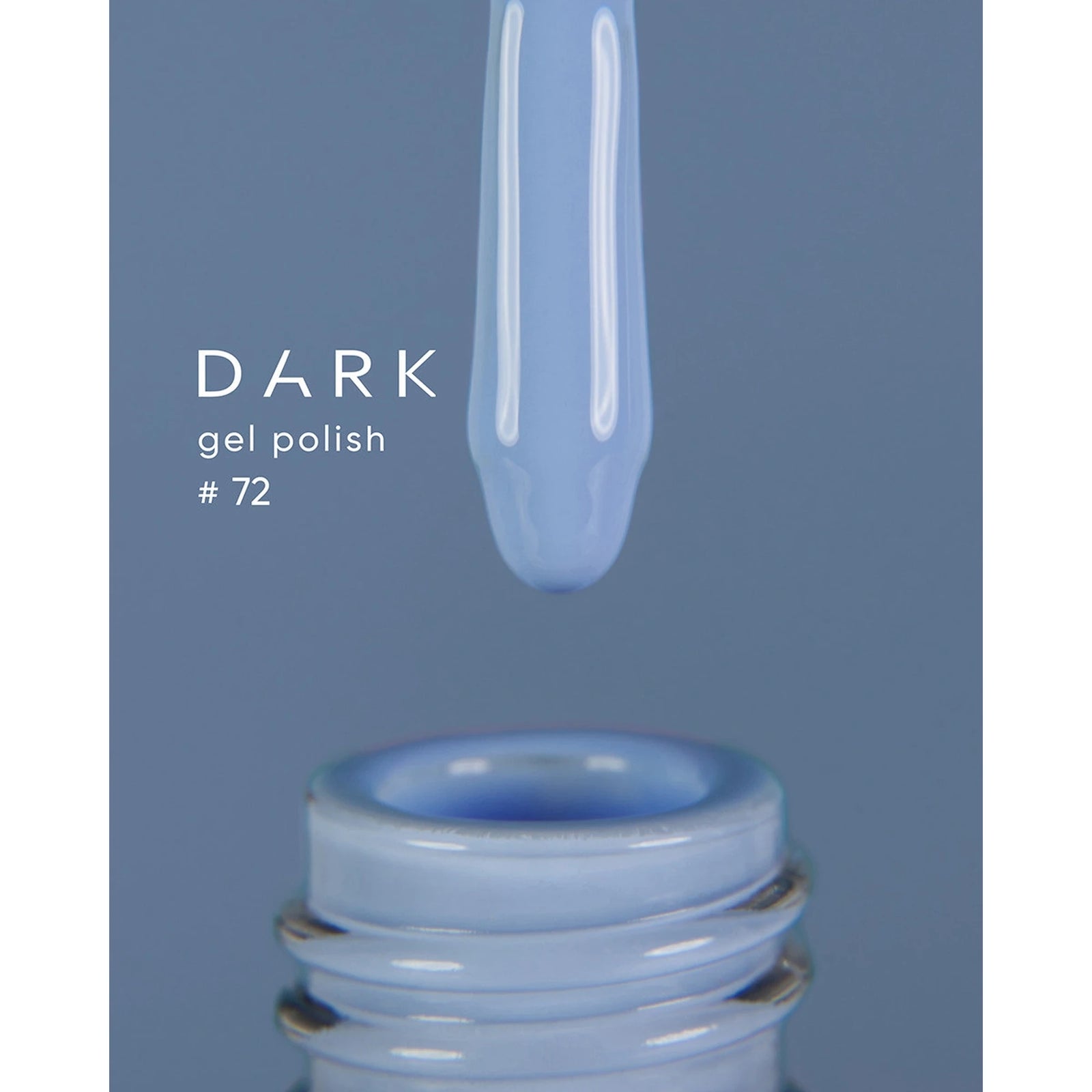 Light blue gel nail polish dark shade #72 closeup with brush and bottle on blue background.