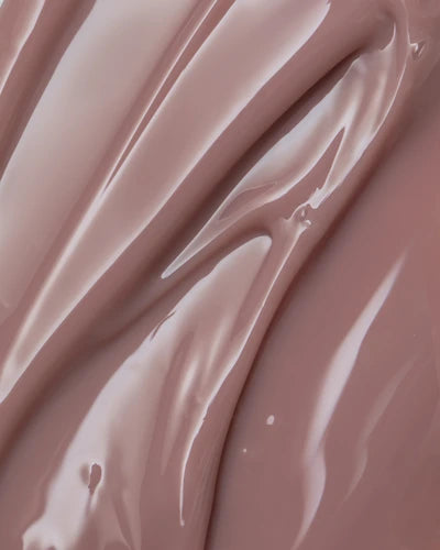 Close-up of nude pink builder gel texture for professional nail enhancement