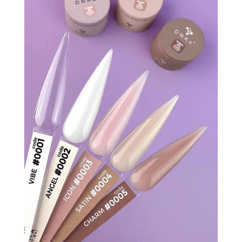 Set of long, pointed nail tips with color codes on a purple background - Photo №2