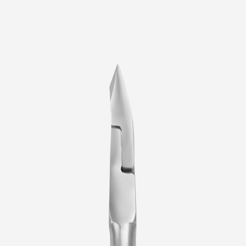 Close-up of stainless steel cuticle nipper blade for professional manicure tools