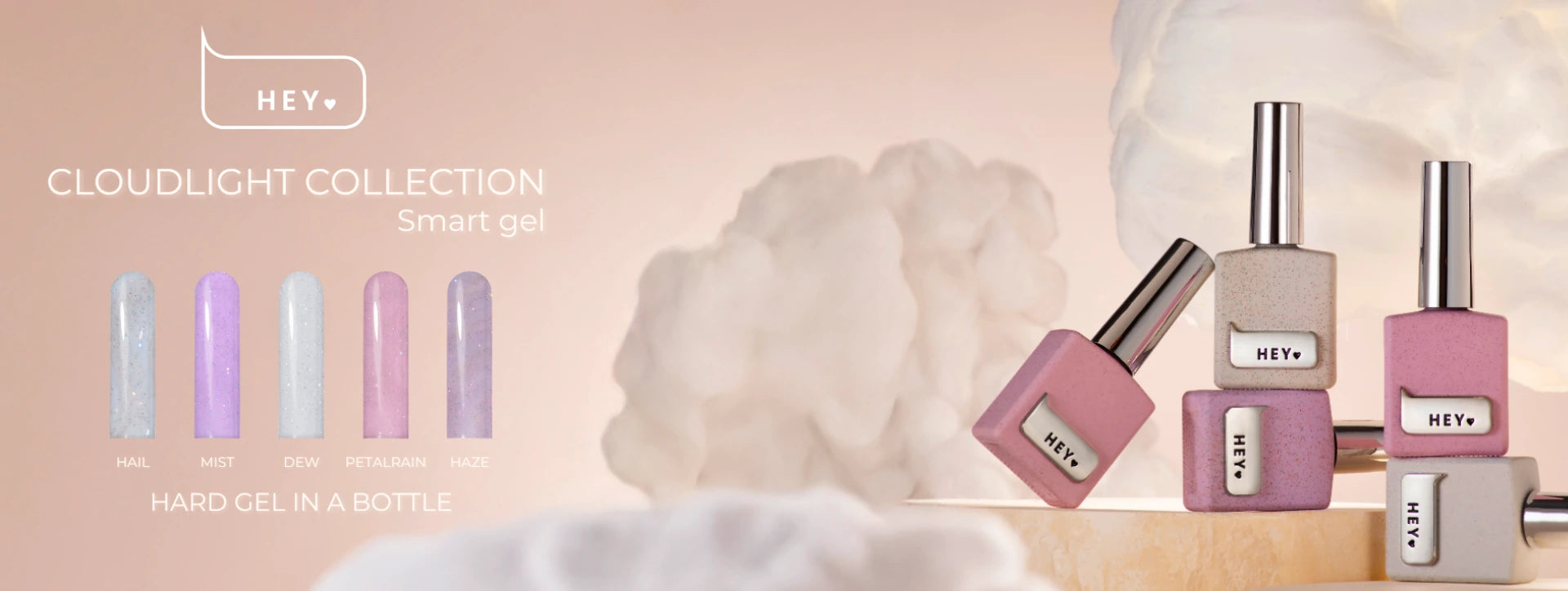 HEYA nail polish bottles with cloud background