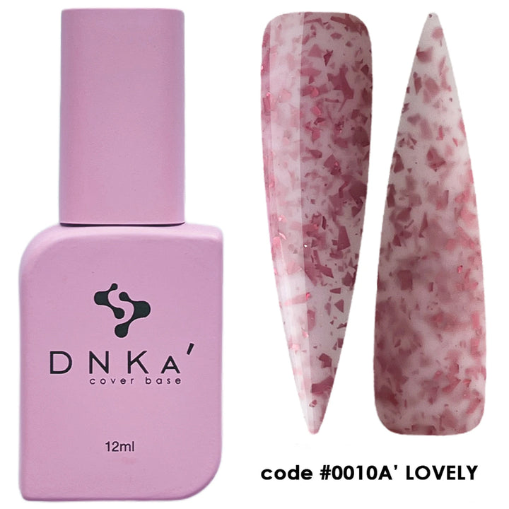 Pink nail polish bottle and decorative nail tips with &
