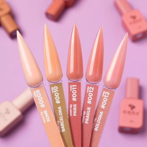 Set of nail polish bottles with pointed tips on a purple background - Photo №3