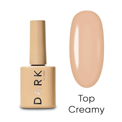 Creamy beige gel nail polish bottle with matching color swatch labeled Top Creamy
