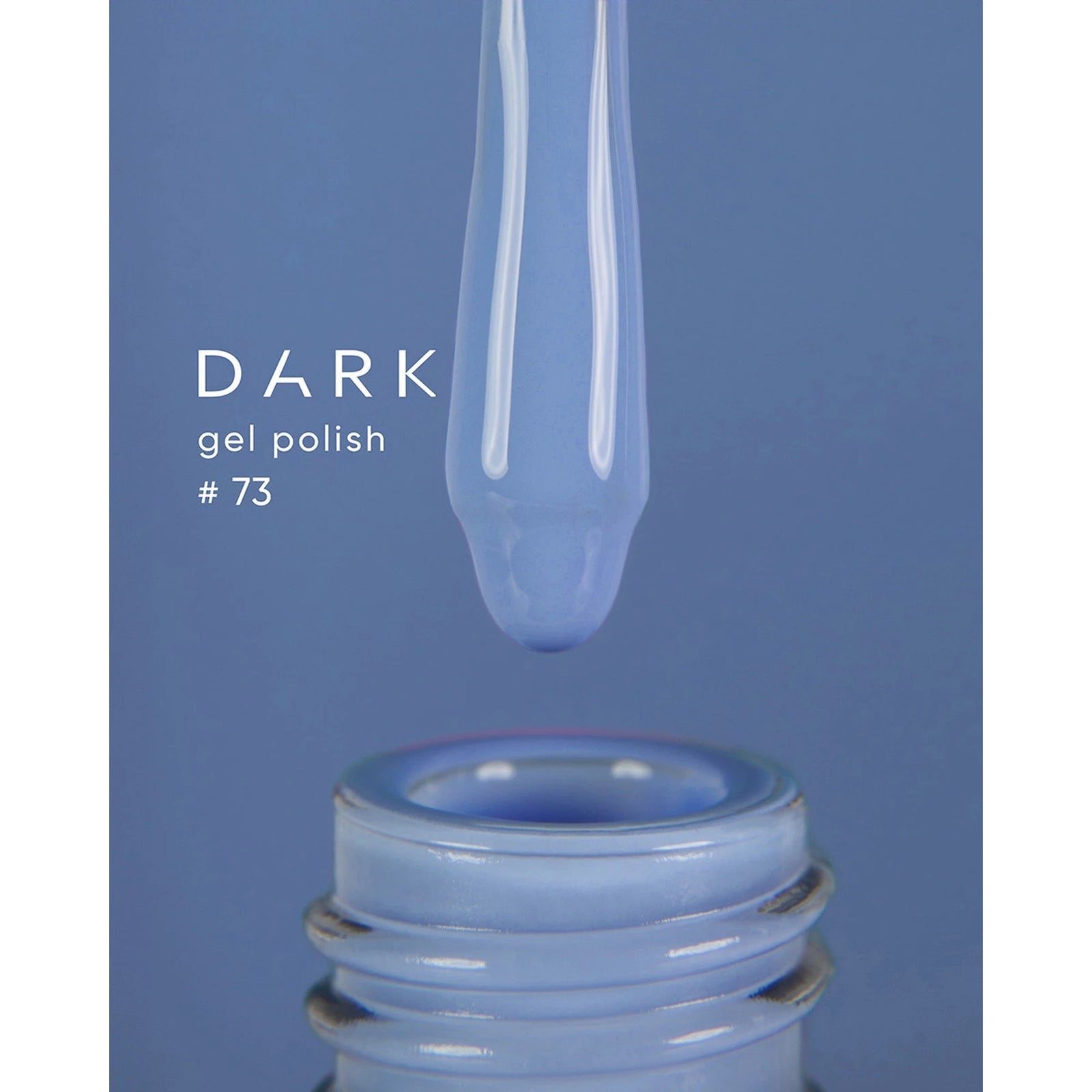 Blue gel polish bottle with brush applicator, labeled dark gel polish shade 73.