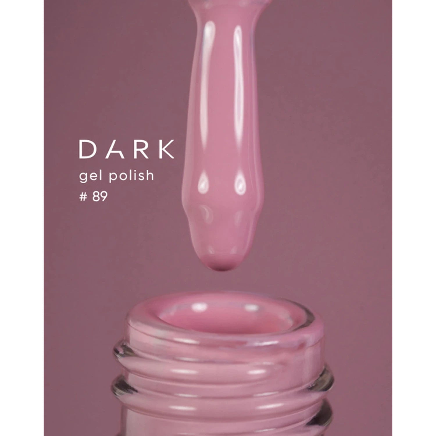 Pink gel nail polish being applied with brush, labeled dark gel polish #89