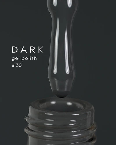 Dark gel polish bottle with applicator brush, shade #30, close-up on black background