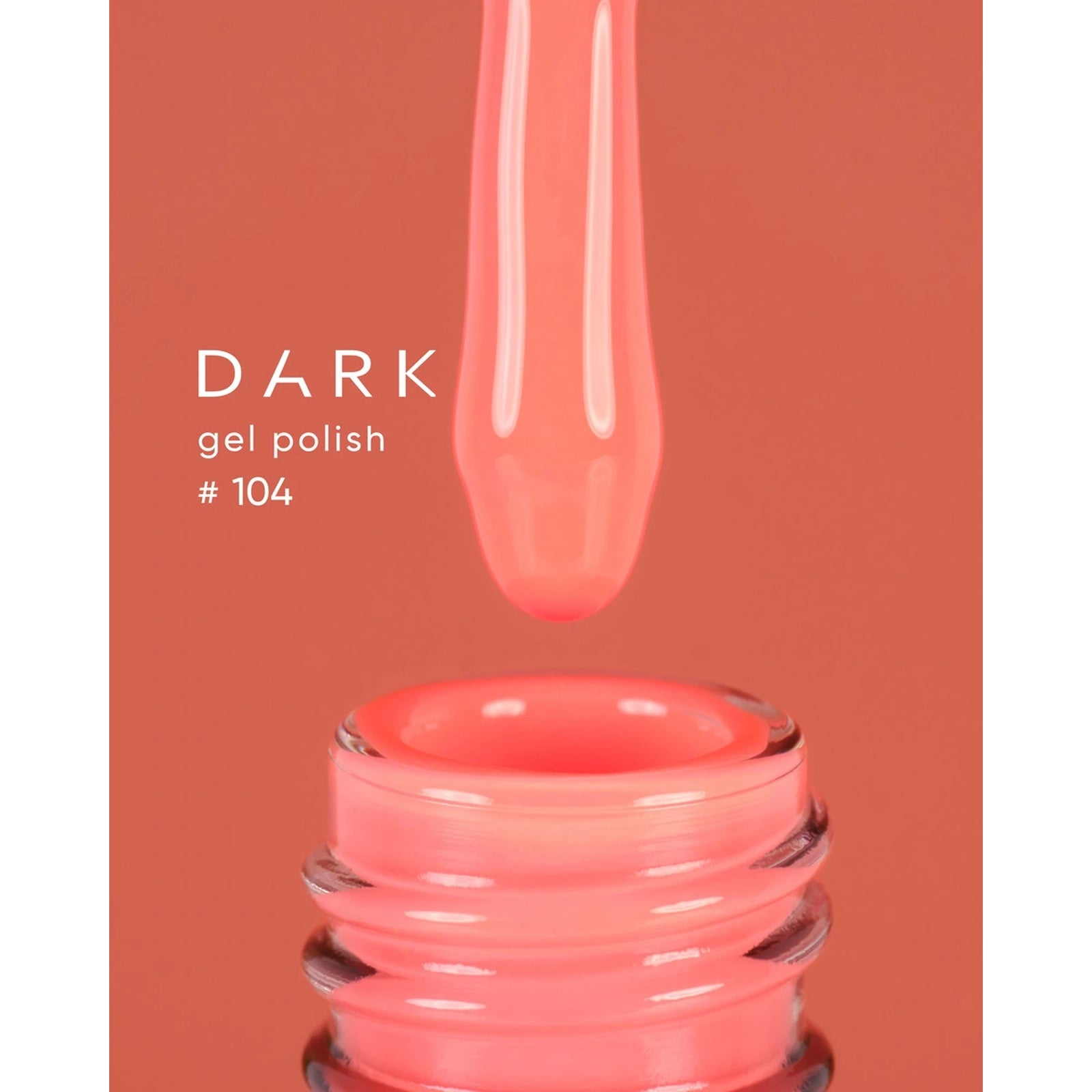 Coral pink gel polish brush and bottle, shade 104, professional nail product