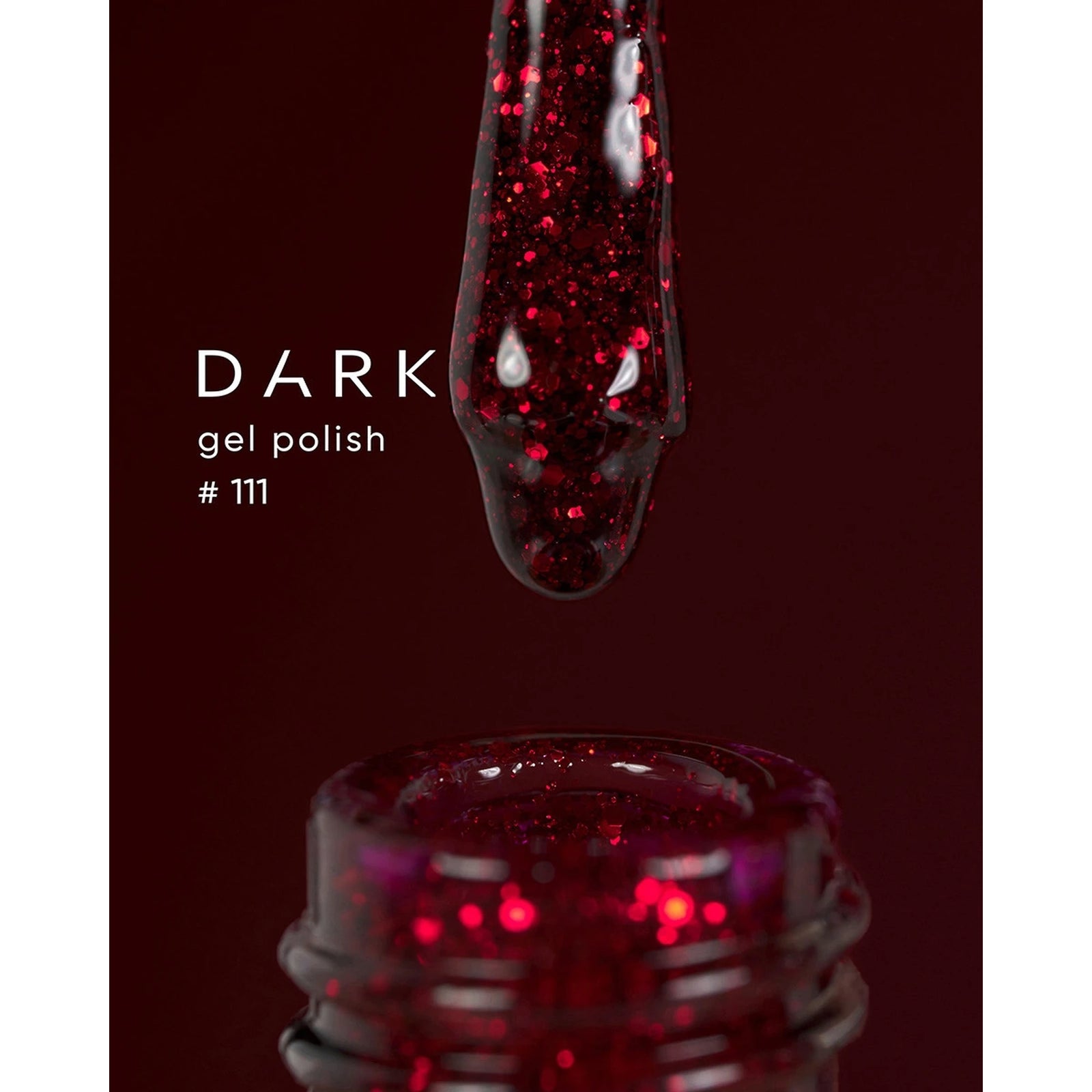 Dark gel polish 111, deep red glitter UV nail polish dripping from brush into bottle