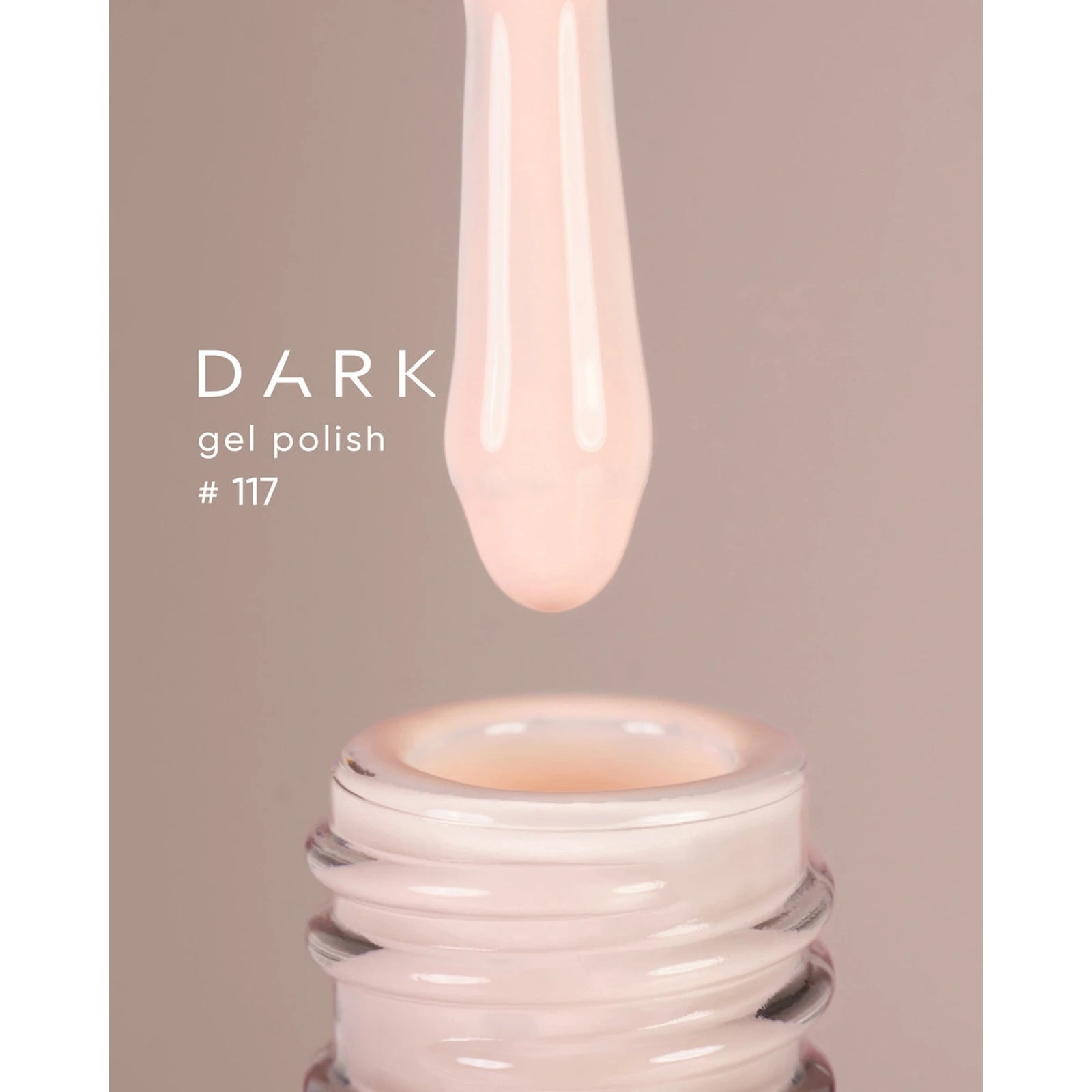 Light pink gel polish brush over open bottle, labeled Dark gel polish #117, nail product