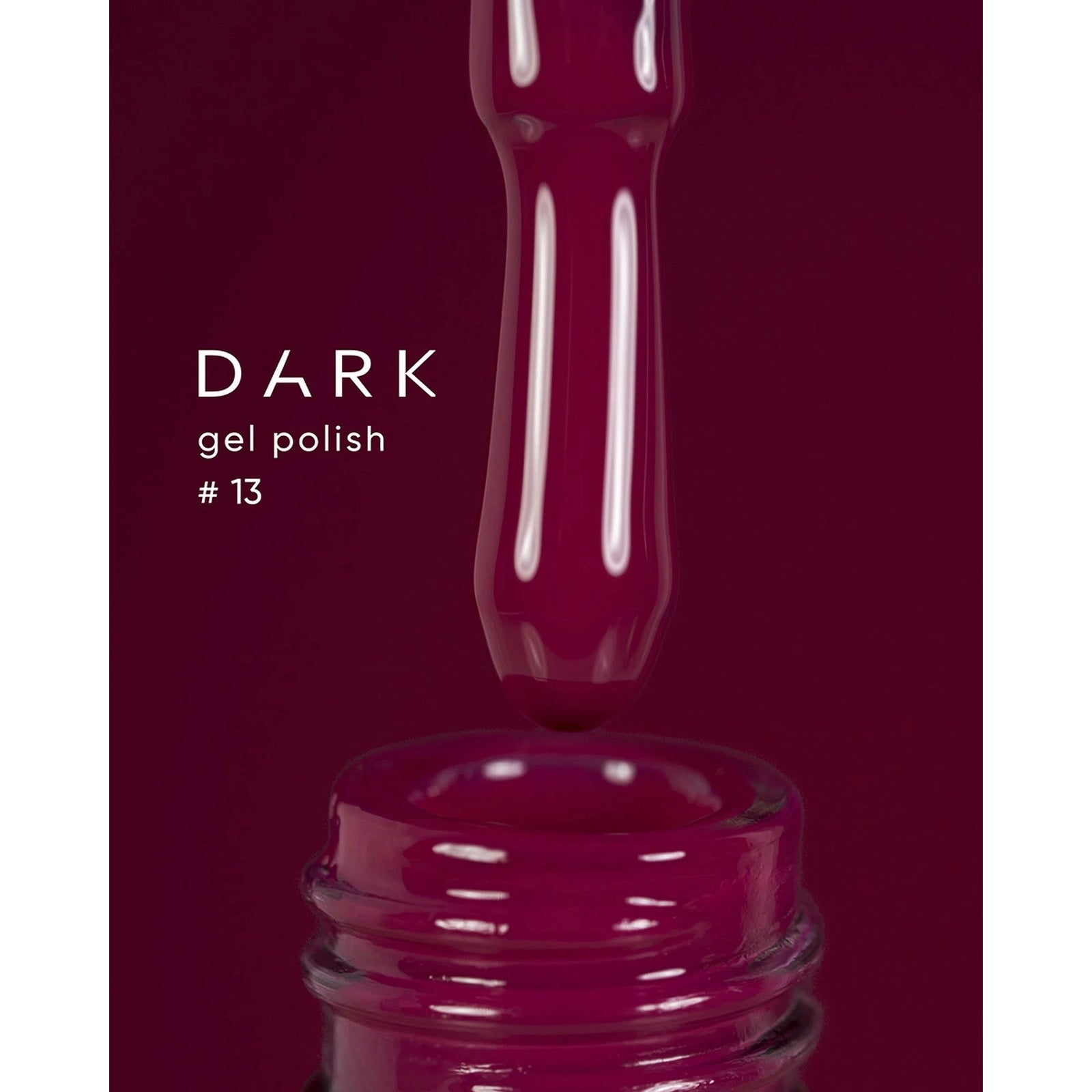 Dark gel polish #13, deep burgundy nail polish with glossy finish in open bottle