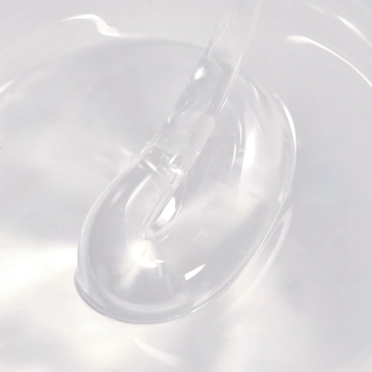 Clear UV gel texture for nails, glossy thick consistency, ideal for manicures