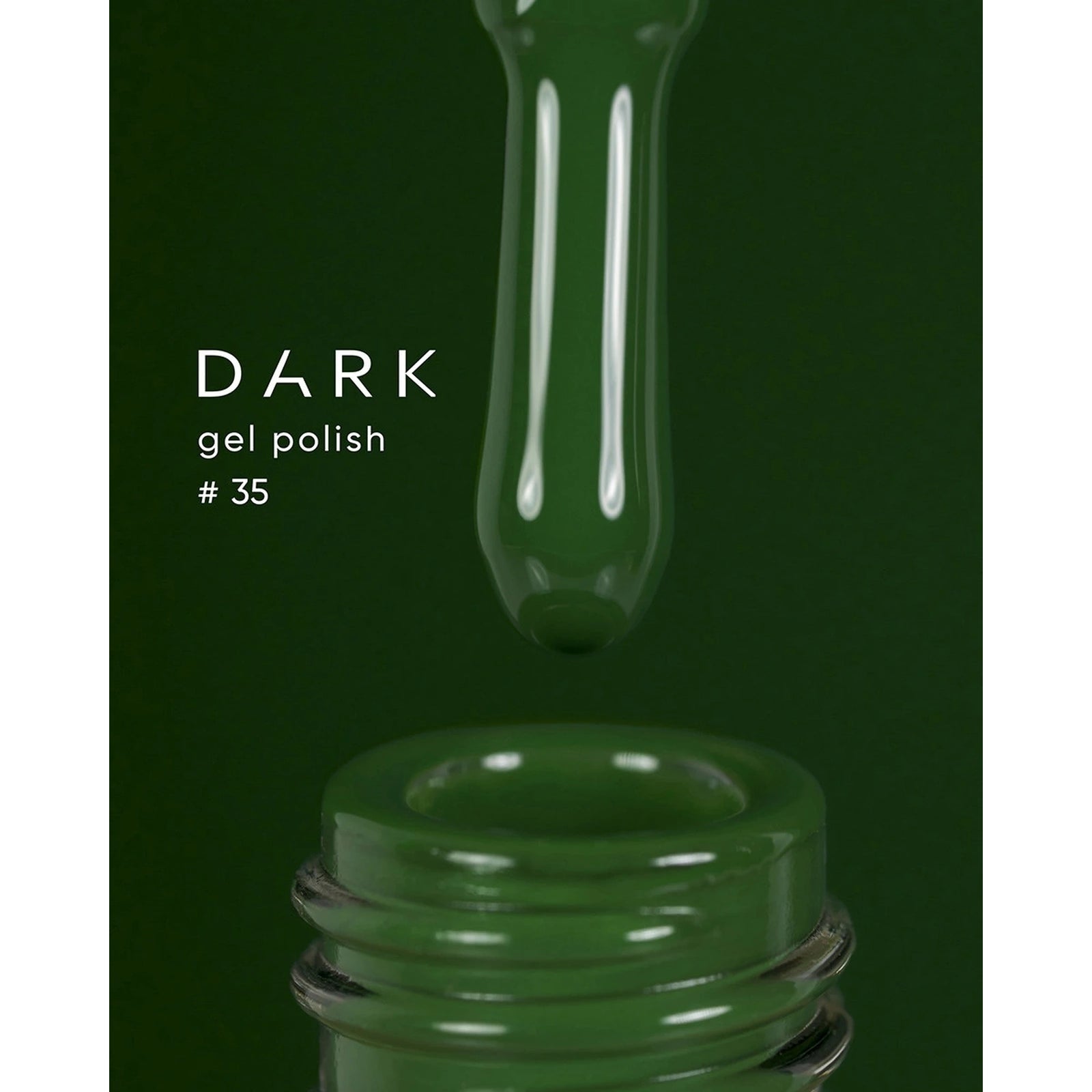Dark green gel nail polish bottle with brush, shade number 35, on green background
