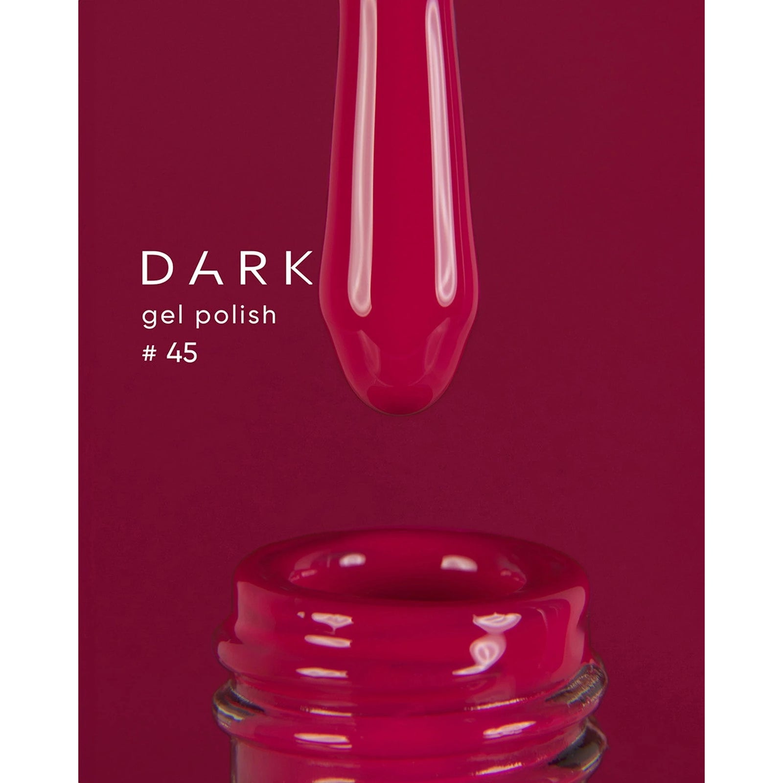 Dark gel nail polish #45 in a deep red shade with brush and open bottle