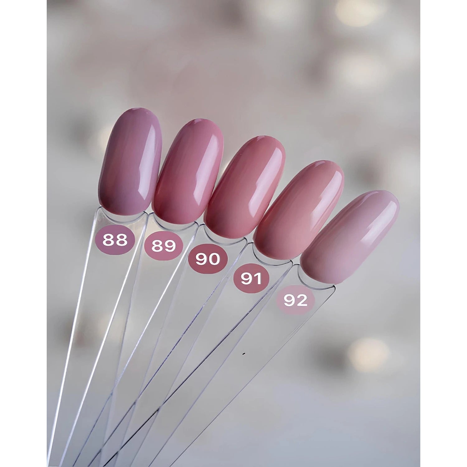 Five mauve and pink gel nail polish swatches labeled 88 to 92, glossy finish.