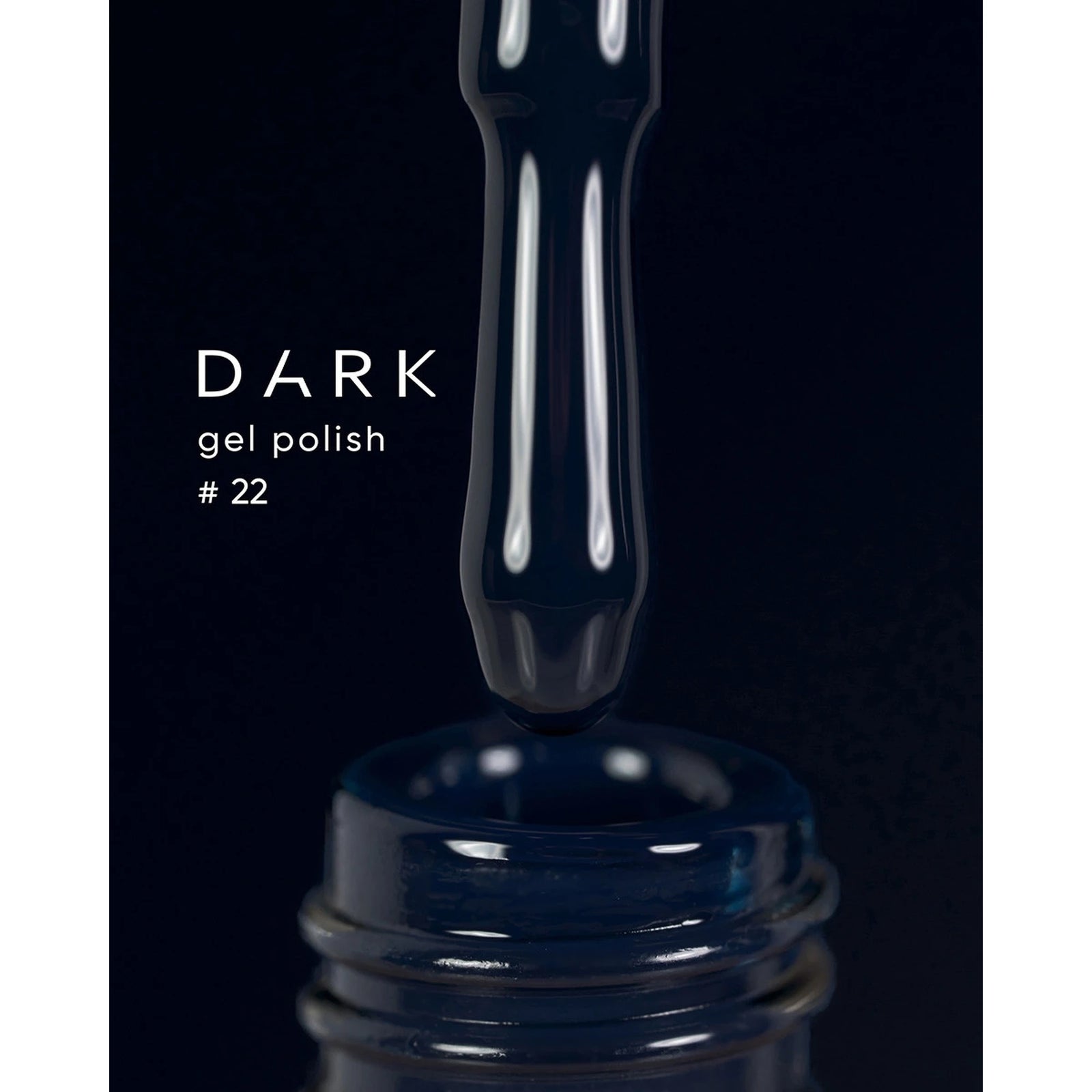Dark gel polish bottle with brush applicator, shade number 22, for manicure