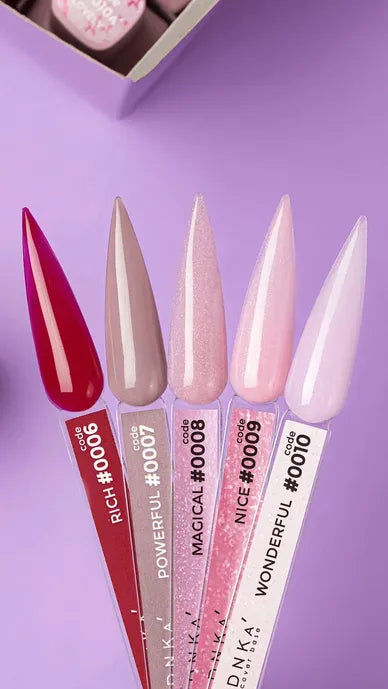 Five gel nail polish samples in pink, nude, and red shades on a purple background