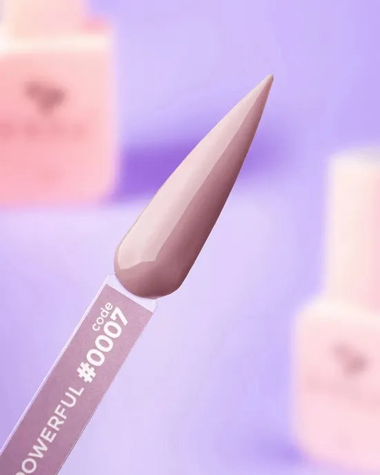 Nude mauve gel nail polish swatch with code 0007 on a purple background.