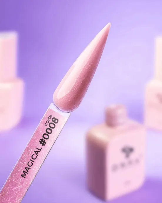 Shimmery pink gel nail polish swatch with code 0008 on a stick, blurred bottles in background