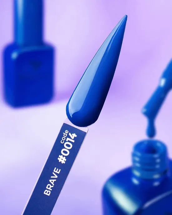 Blue rubber base gel polish swatch marked code 0014, with open nail polish bottles