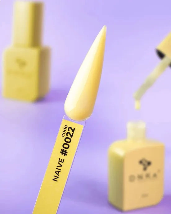 Yellow nail gel polish swatch labeled NAIVE #0022 with matching bottles on purple background