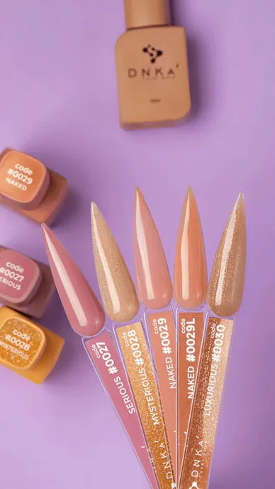 Nude and beige gel nail polish color samples with labeled tips on a purple background